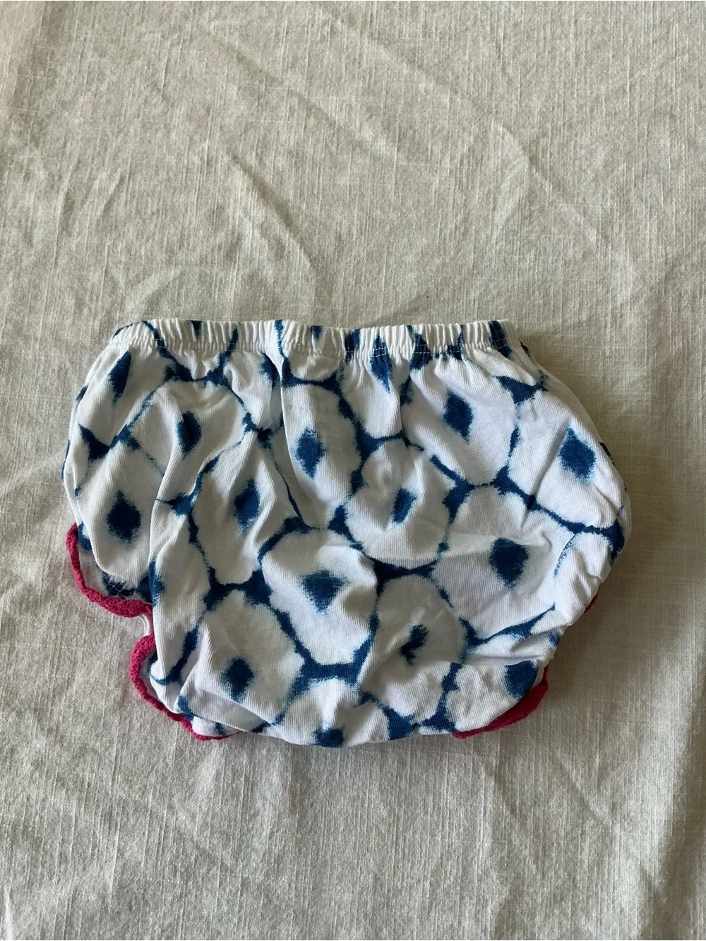 White Diaper Cover with Navy Tie-Dye Spots and Pink Ruffle Trim
